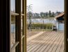 Stilvolles Doppelzimmer mit Gemeinschaftsterrasse und Blick auf Elbe und Blaues Wunder im Boutique Hotel La Campagnola, Dresden-Loschwitz.